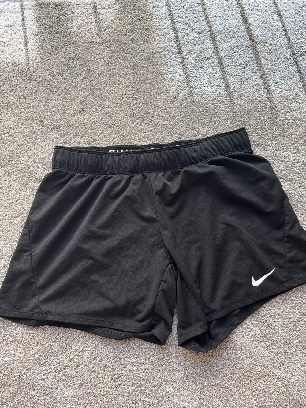 Nike Black Athletic Shorts with White Swoosh